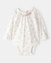 Body de manga larga floral con cuello de volantes en algodón