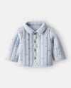 Blue polka dot puffer jacket
