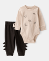 2-piece set with dinosaurs and spiked shorts