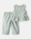 Two-piece linen blouse and pants set, green striped design
