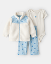 Conjunto tres piezas chaqueta de borreguito, body y pantalón floral azul