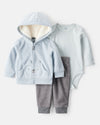 Three-piece set with blue cardigan, patterned bodysuit and trousers