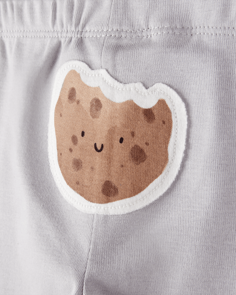 Conjunto tres piezas pantalón y dos bodies diseño galletitas - Carter´s