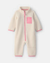 Mono de micropolar con cremallera, bicolor crema y rosa