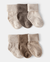Pack of 6 baby booties in brown tones with cuffs