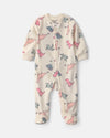 Velour footed pajamas, cream dinosaurs