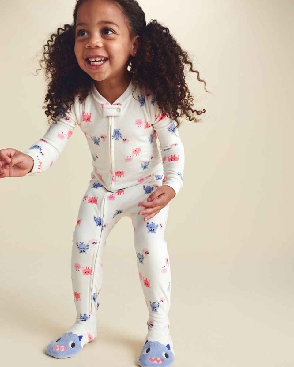 Pijama de terciopelo con pie, monstruos color crema - Carter's