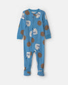 Pijama de una pieza con pie, leche y galletas en azul