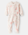 Pijama enterizo microfleece crema con estampado cowgirl